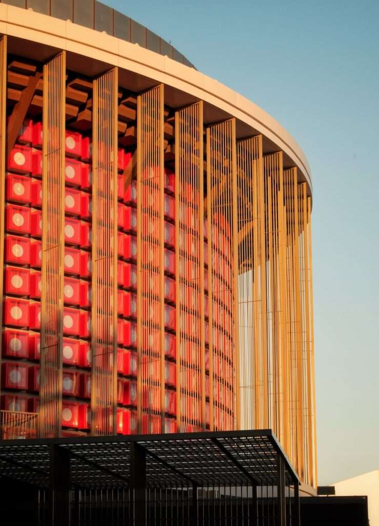 a large building with a lot of red balls on it